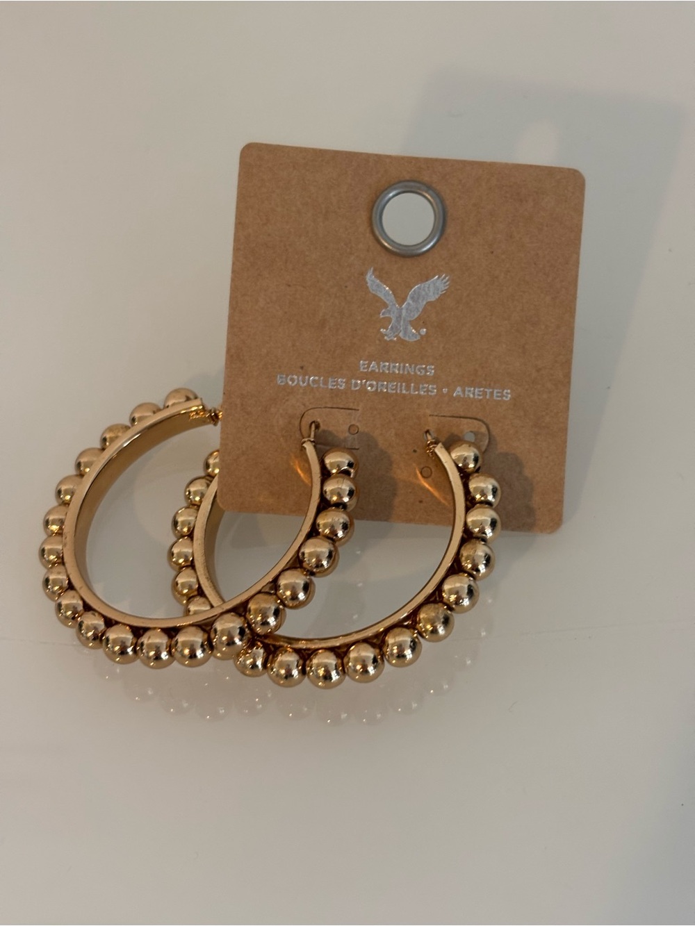 American Eagle Gold Tone Beaded Hoop Earrings